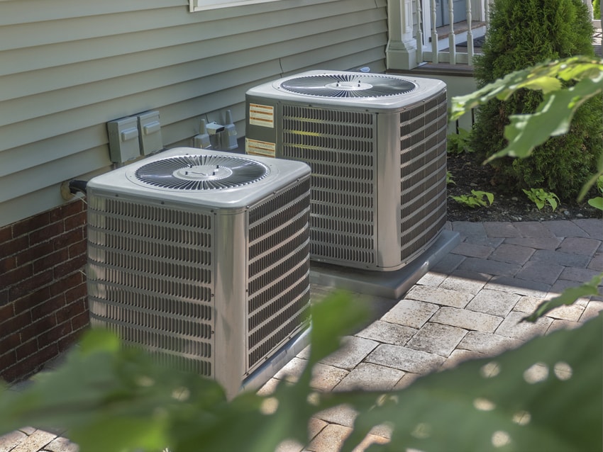 A/C Replacement Utopia - Two AC Units Outside of a Home